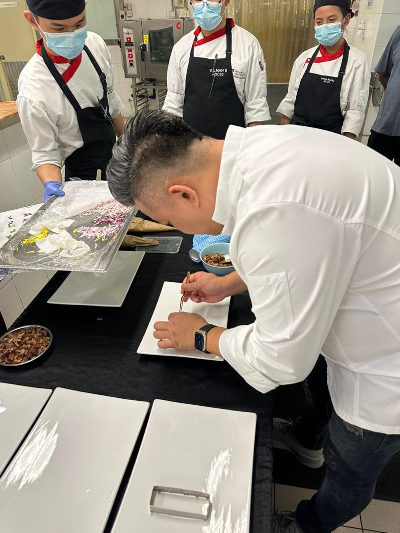 The inspiration lecture, addressing students at Taylor's Culinary Institute