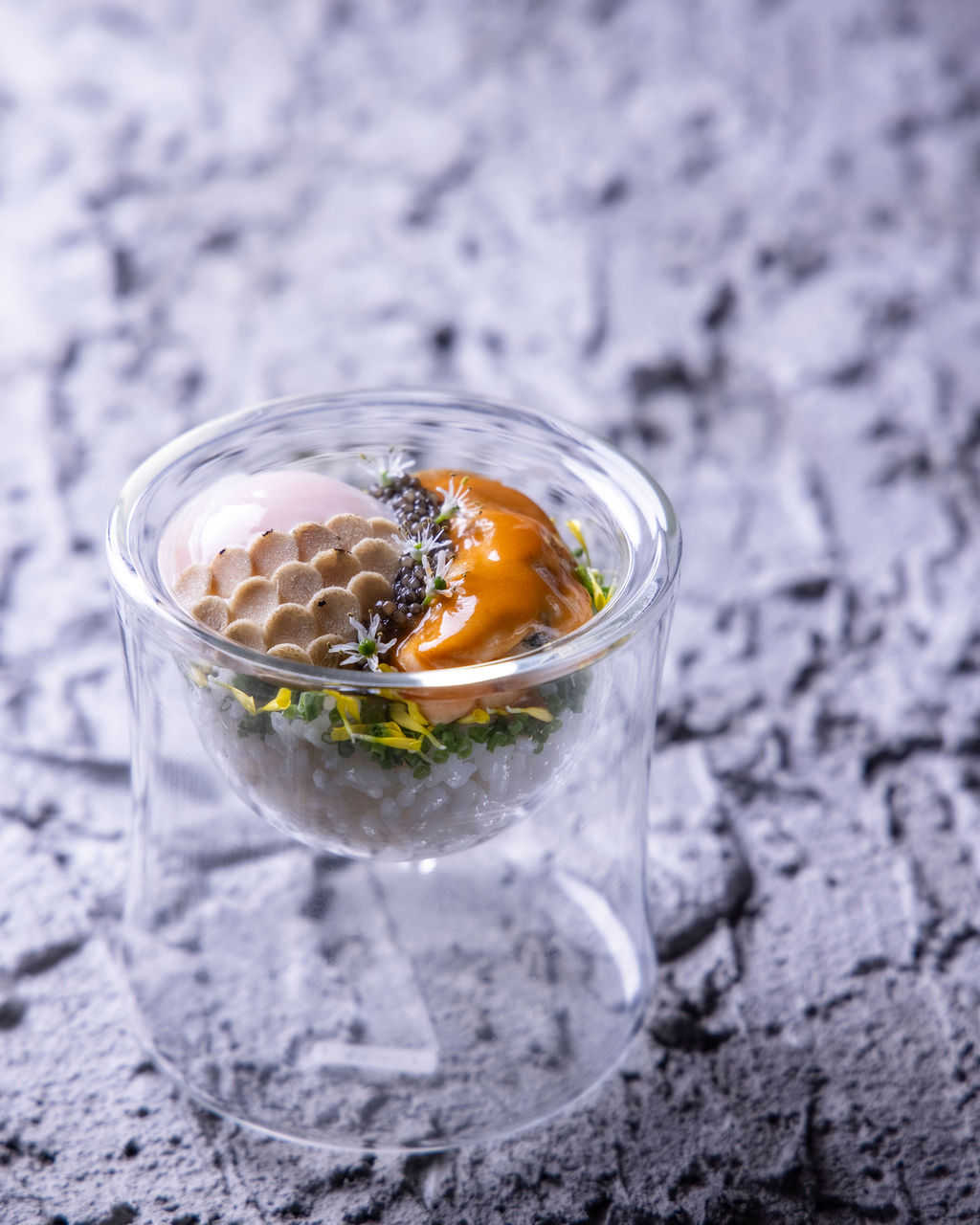 Caviar, egg, sea urchin and truffle Hayashi rice in a glass coupe