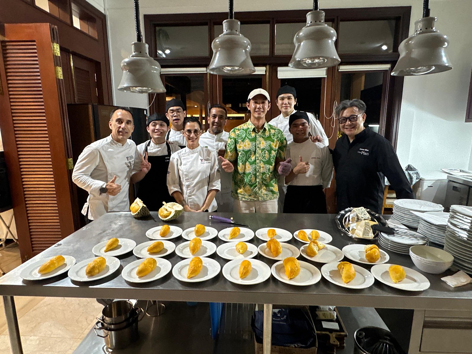 Chef James Won with the Taylor's Culinary Institute brigade and the durian grower at the close of service