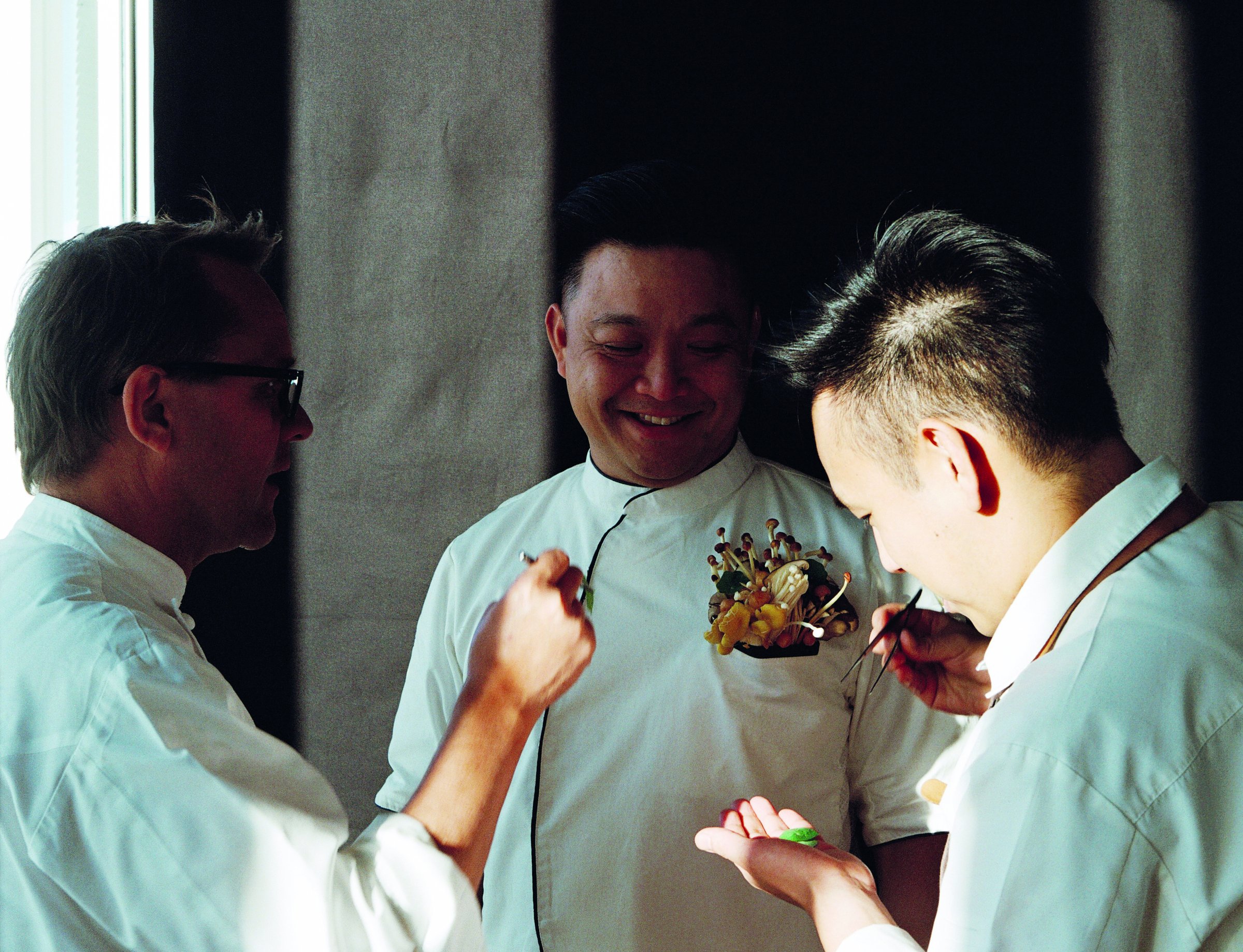 James Won with two chefs at the Krug Ambassade tasting moment, Tokyo &mdash; photograph by Carol Sachs