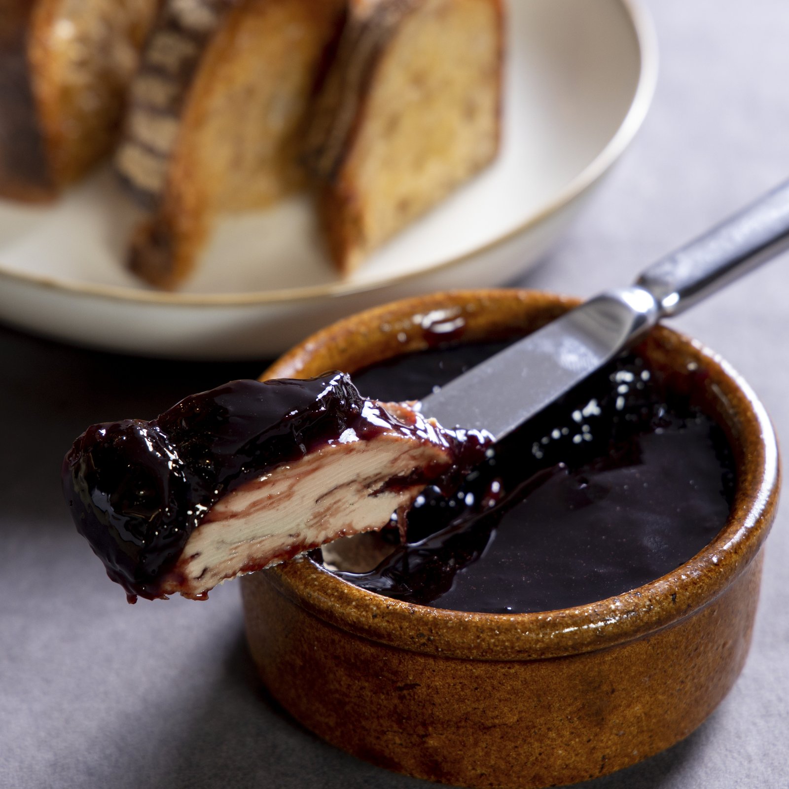 Bouchon Enfin chicken liver parfait — wider frame with bread plate and port-wine jelly.