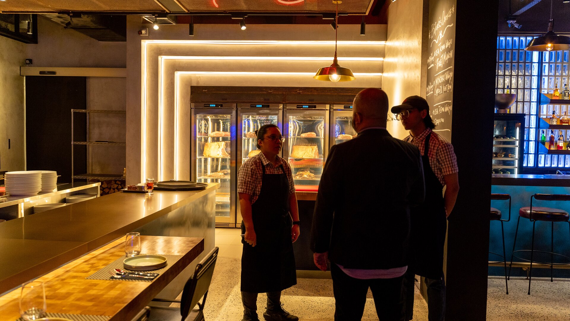 MeatMore — the cocktail bar as parallel architecture to the dining room.