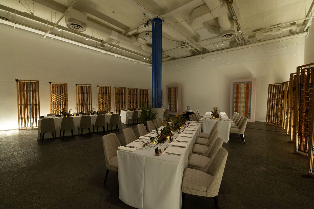 Long tables set for the evening at Seaside Studio CASO