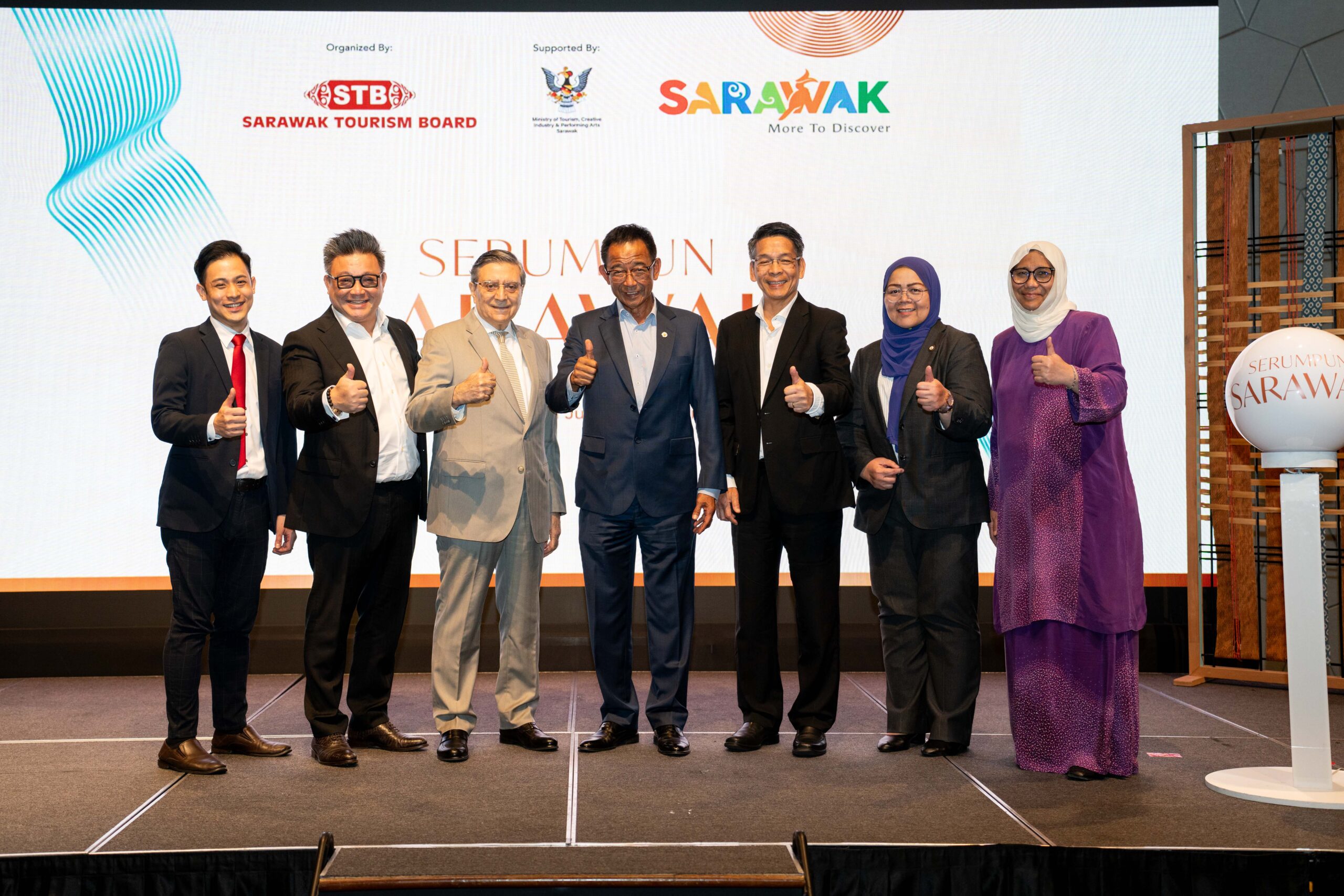 Guests of honour on stage at the launch of Serumpun Sarawak, July 2025.